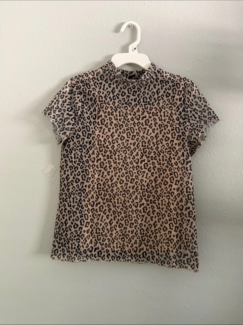 Justice Short Sleeve Mock Neck Tee in Beige and Black Leopard Print